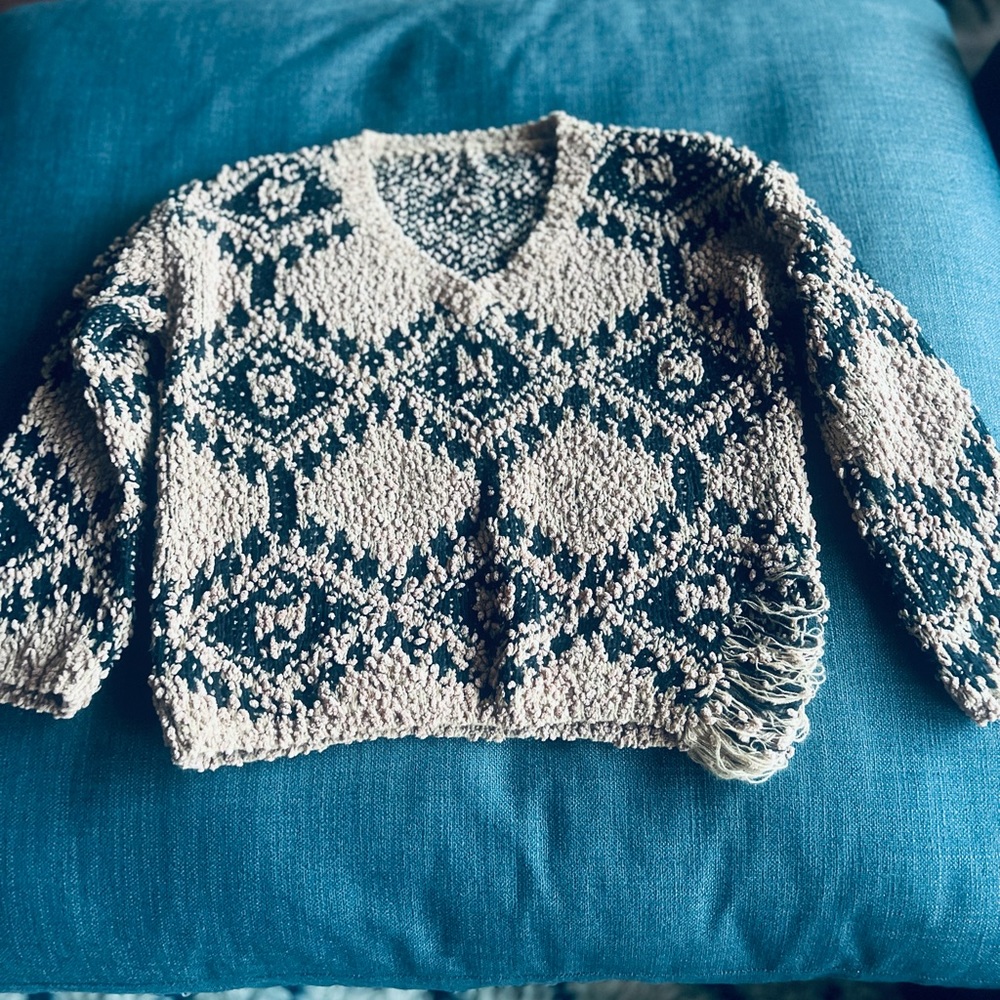 Distressed sweater